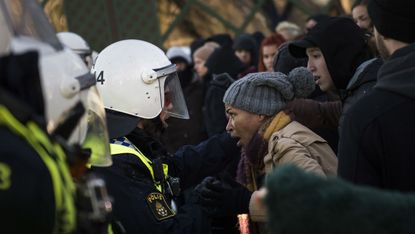 Police blocks anti-neo-nazi protesters in Stockholm last year