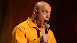 Joe Rogan gives an exaggerated facial expression during his Netflix standup special Burn the Boats.