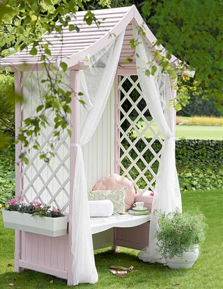 garden arbor ideas: white and pink design with curtains