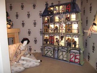 The large dolls house in the children's bedroom, featuring Chanel dolls created through the years