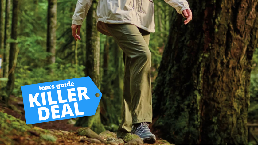 the Columbia Leslie Falls Pant in a nature setting next to a Tom&#039;s Guide Killer Deal label