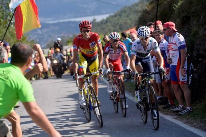 Alberto Contador (Tinkoff-Saxo) gets out of the saddle alongside Alejandro Valverde (Movistar) and Joaquim Rodr&iacute;guez (Katusha)