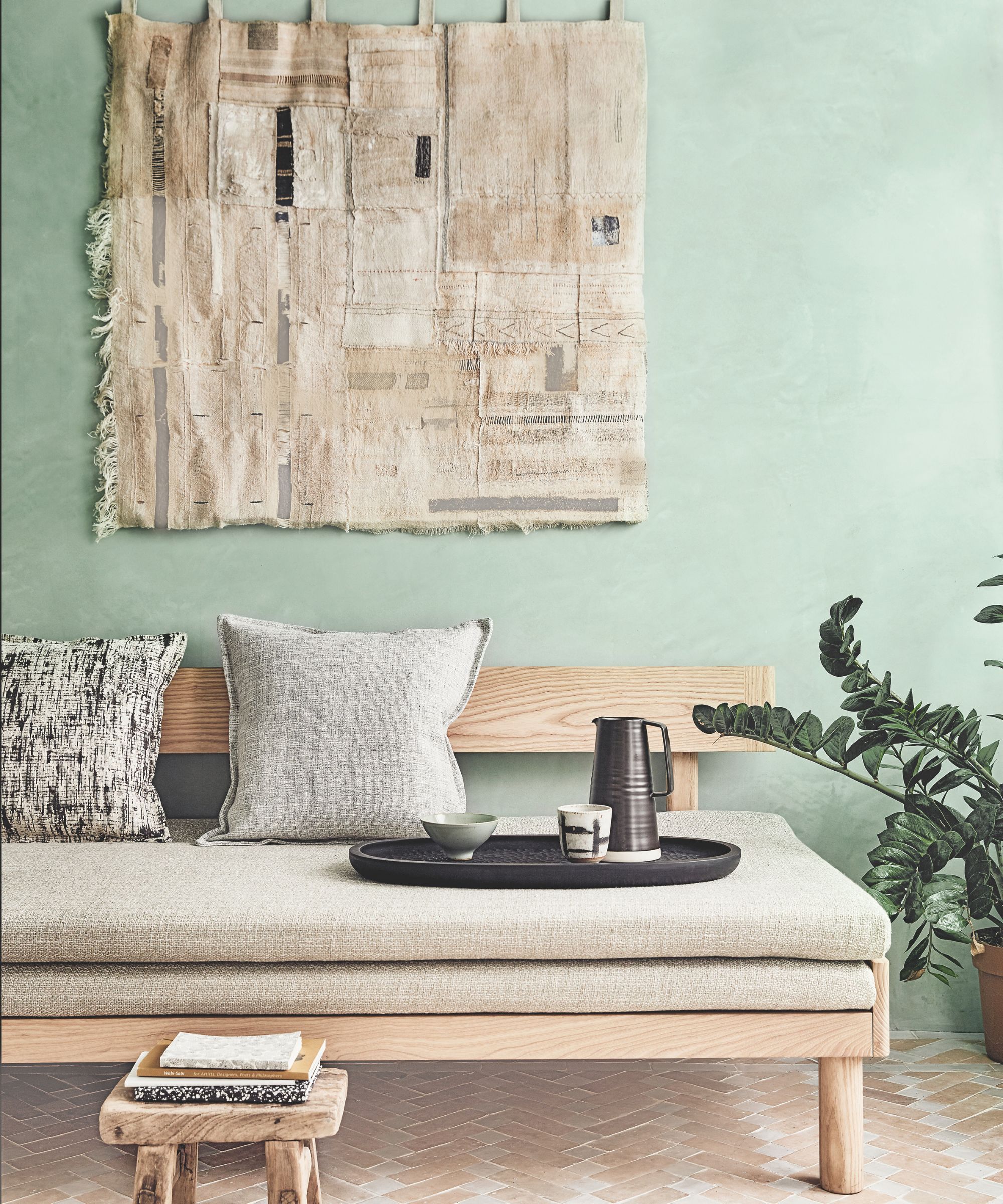 Wall hanging in green sitting room