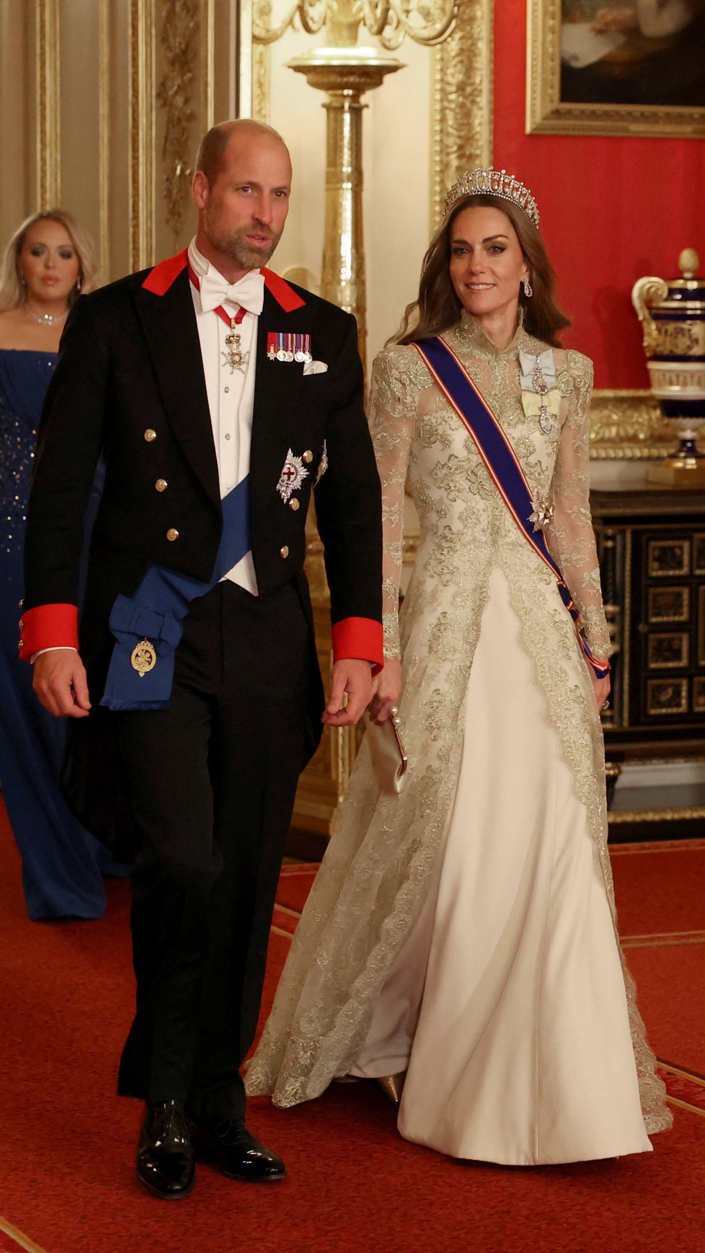 William, Prince of Wales and Catherine, Princess of Wales walk to attend the State Banquet at Windsor Castle