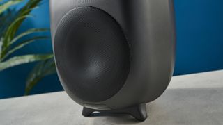 the majority d80 speakers, a pair of black egg-shaped speakers with mesh casing, HDMI, bluetooth, aux connectivity