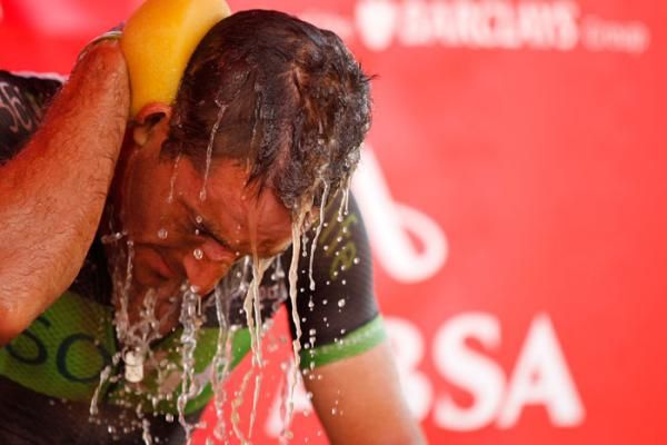 The heat and dust have been daily challenges to deal with. Kevin Evans cools off after a successful Stage 3.