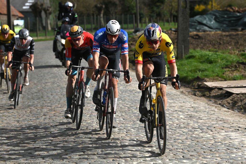 HARELBEKE BELGIUM MARCH 24 LR Matej Mohori of Slovenia and Team Bahrain Victorious Mathieu Van Der Poel of The Netherlands and Team AlpecinDeceuninck and Wout Van Aert of Belgium and Team JumboVisma compete in the breakaway during the 66th E3 Saxo Bank Classic Harelbeke 2023 a 2041km one day race from Harelbeke to Harelbeke on UCIWT March 24 2023 in Harelbeke Belgium Photo by Tim de WaeleGetty Images