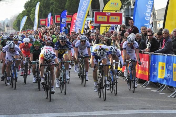 Michael Van Staeyen of Belgium crosses the finish line to win the first stage