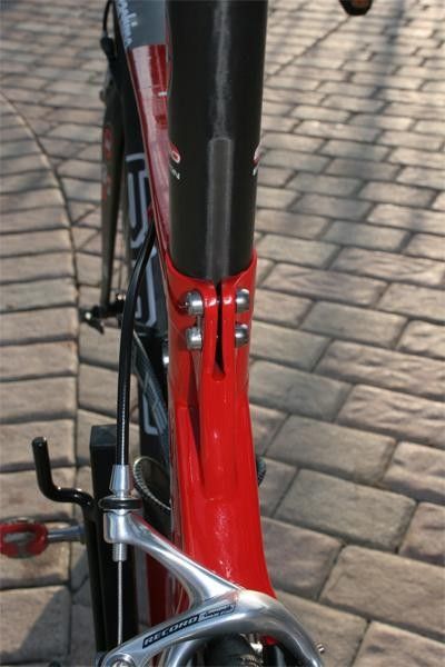The two-bolt clamp. Singenberger says this is much safer, taking pressure off the carbon seatpost