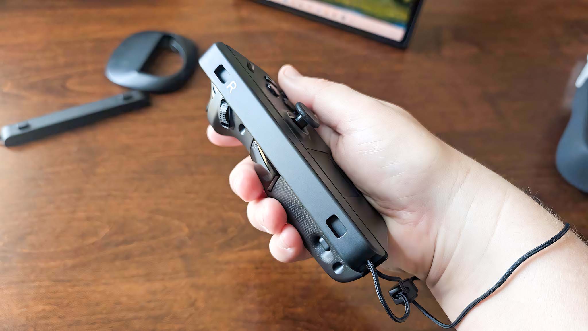 This Legion Go accessory unites the handheld's detached controllers into one comfortable gamepad like a Nintendo Switch Joy-Con