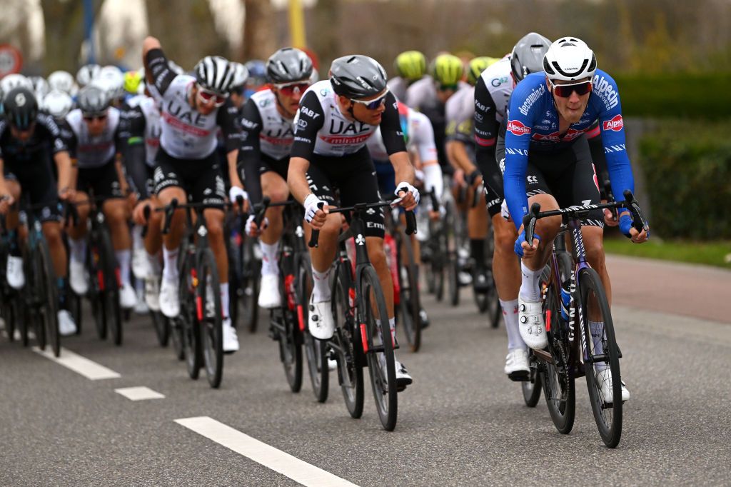 KOKSIJDE BELGIUM MARCH 17 Ayco Bastiaens of Belgium and Team AlpecinDeceuninck leads the peloton during the 21th Bredene Koksijde Classic 2023 a 1916km one day race from Bredene to Koksijde on March 17 2023 in Koksijde Belgium Photo by Luc ClaessenGetty Images