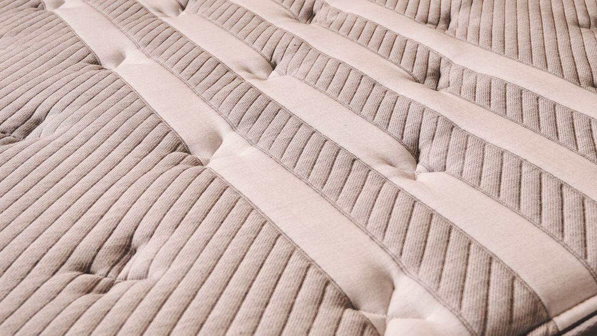 A close-up look at the Leesa Studio Chill's stylish striped cover design