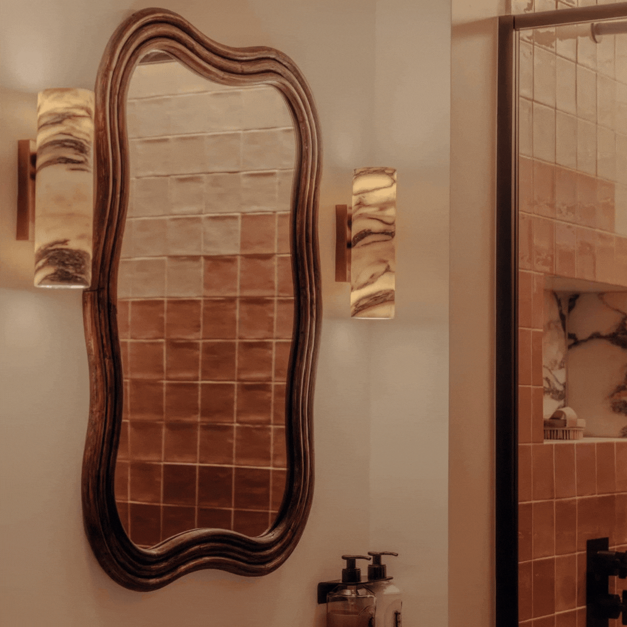 A rotating gif depicting a bathroom decked up with glazed, caramel-tinted ceramic tiles and a product shot of a six-piece wall made with them.