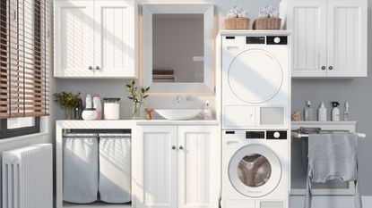 white laundry room with washing machine, dryer and laundry baskets
