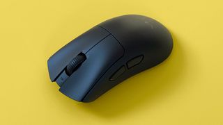 A Razer DeathAdder V3 HyperSpeed mouse against a yellow background.