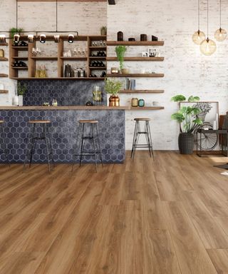 module wood effect vinyl flooring in a modern kitchen with octagonal tiles and exposed brick