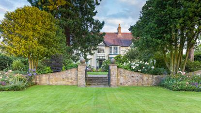 lawn area and garden wall of a terraced garden