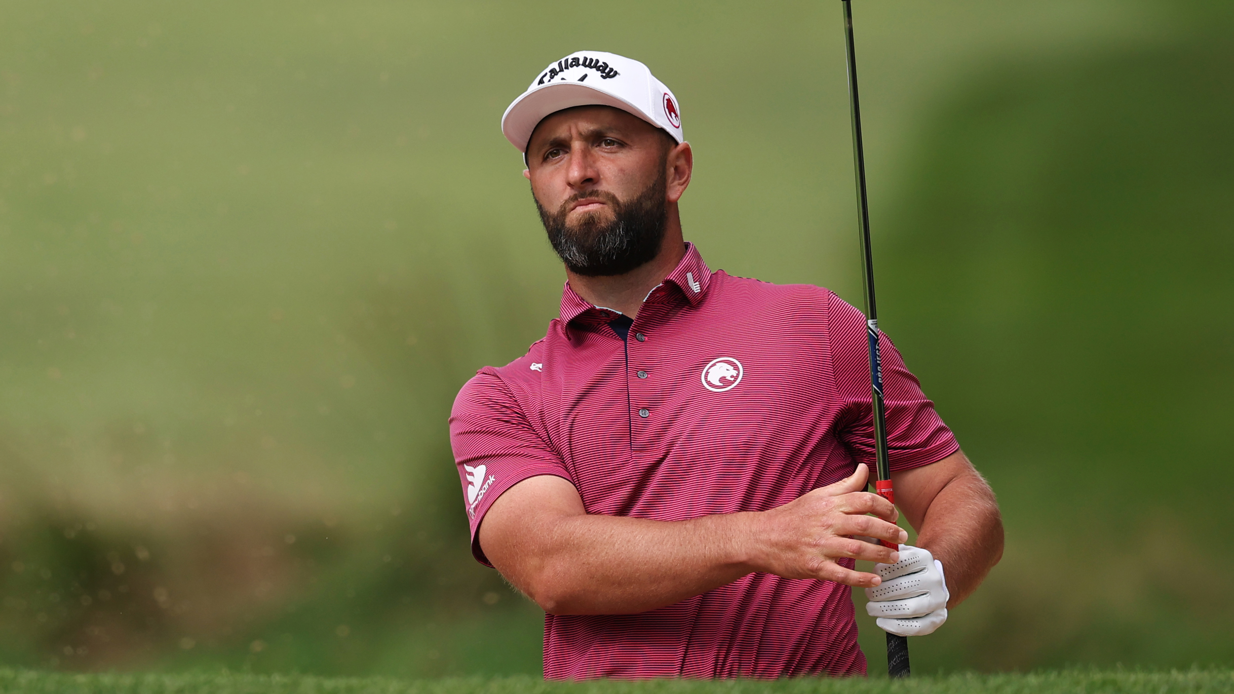 Jon Rahm holds his finish on a wedge shot