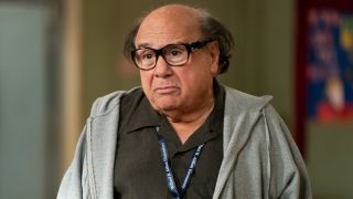 Danny Devito as Frank Reynolds volunteering at Abbott Elementary.