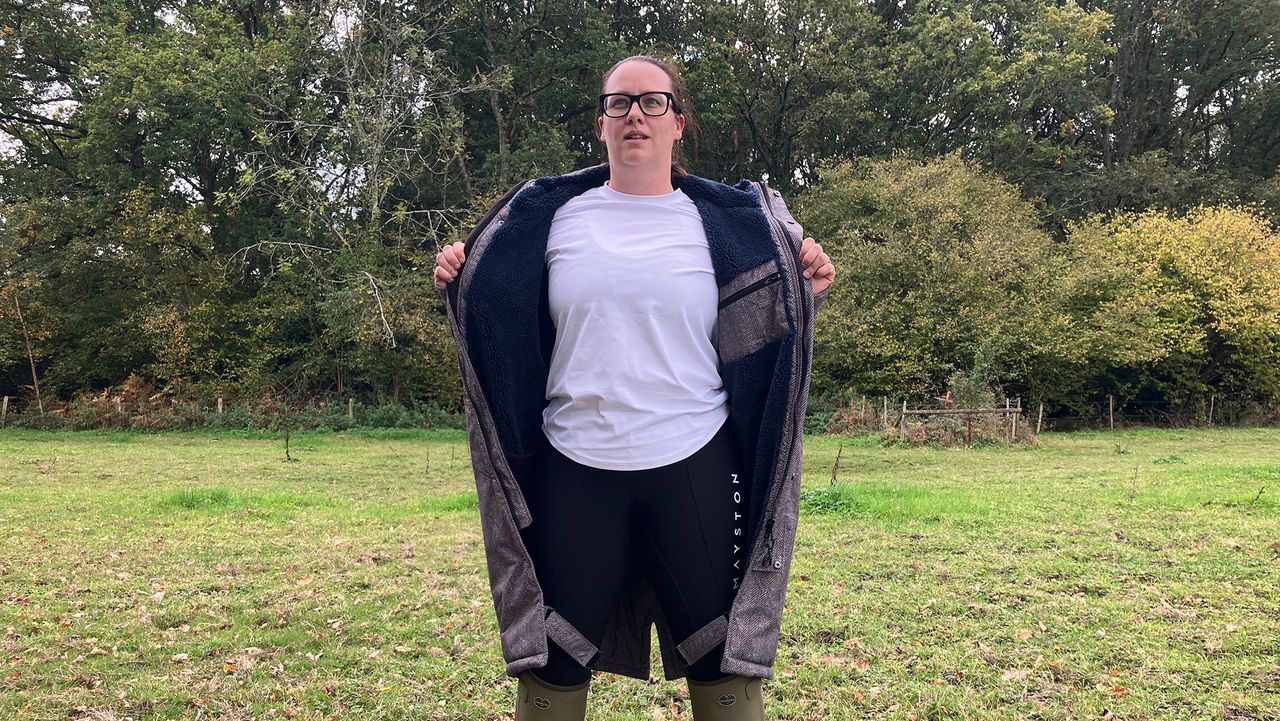 Lady wearing Hestt Eco-Ultra Riding Robe showing lining