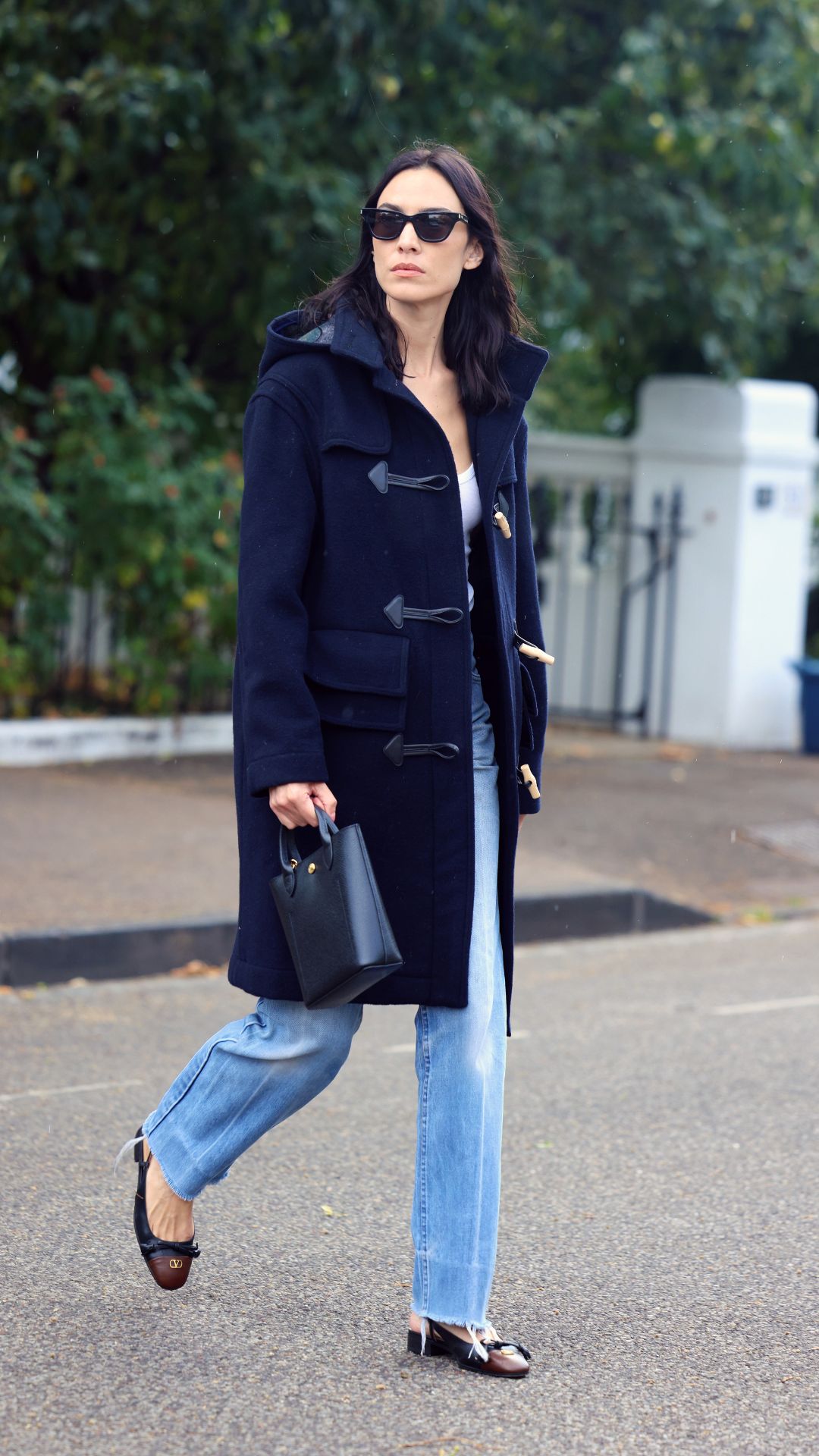 alexa chung wearing a navy duffle coat