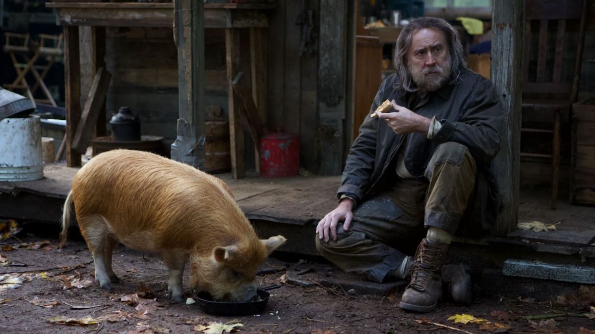 Nicolas Cage and a pig in the pig-related movie &#039;Pig&#039;.