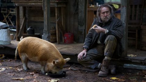 Nicolas Cage and a pig in the pig-related movie 'Pig'.