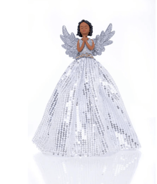 A black angel tree topper wearing a white dress against a white background.