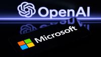 The Microsoft logo is being displayed on a smart phone, with the OpenAI logo visible on the screen in the background.
