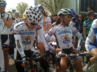 Shelley Evans and Coryn Rivera wait for a re-start of the Merco Criterium after a crash with three laps to go.