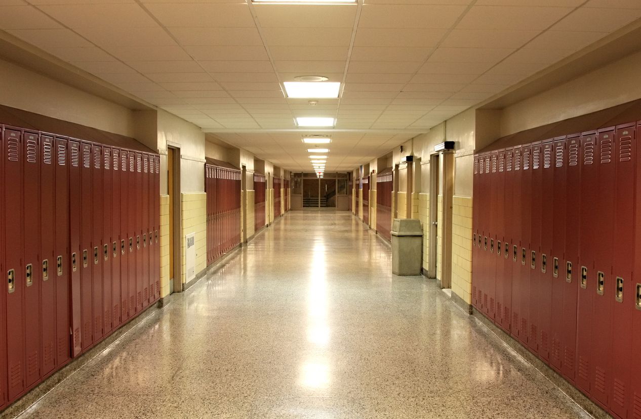 An empty high school hallway.