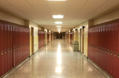 An empty high school hallway.
