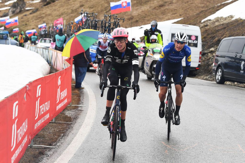 CORTINA DAMPEZZO ITALY MAY 24 Giulio Ciccone of Italy and Team Trek Segafredo Joao Almeida of Portugal and Team Deceuninck QuickStep Hugh Carthy of United Kingdom and Team EF Education Nippo in breakaway passing through Passo Giau 2233m during the 104th Giro dItalia 2021 Stage 16 a 153km stage shortened due to bad weather conditions from Sacile to Cortina dAmpezzo 1210m Snow girodiitalia Giro on May 24 2021 in Cortina dAmpezzo Italy Photo by Tim de WaeleGetty Images