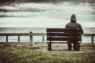 Lonely man on bench