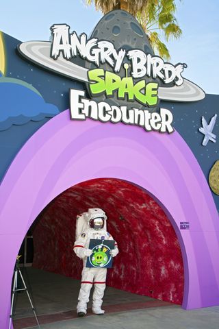 Spaceperson at Entrance to Angry Birds Space Encounter Exhibit