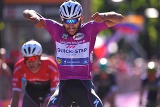 Fernando Gaviria celebrates Giro d'Italia win number four.