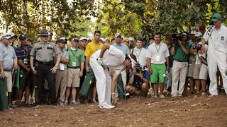 Bubba Watson prepares his second shot in the second playoff hole at the 2012 Masters