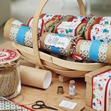 room with wooden basket on table 