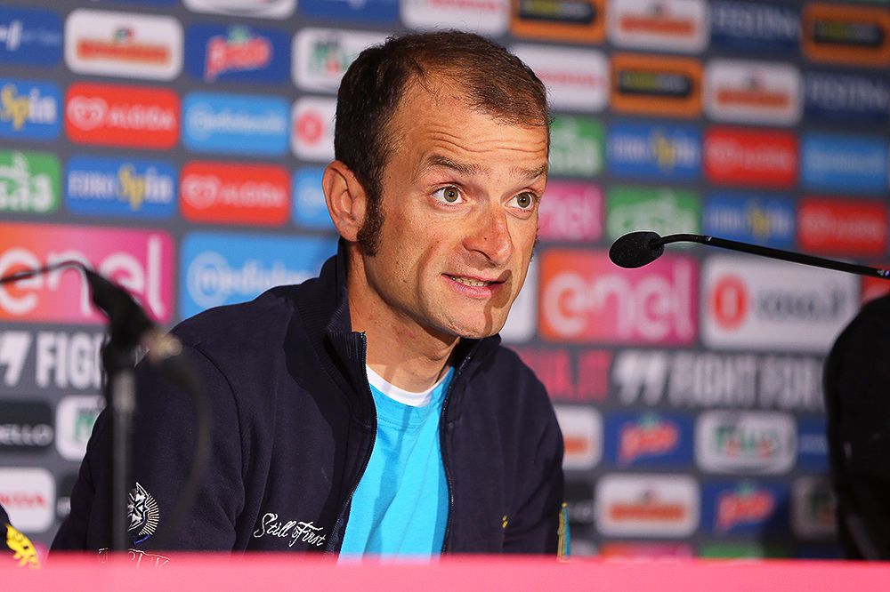 Michele Scarponi answers a question at the Astana press conference.