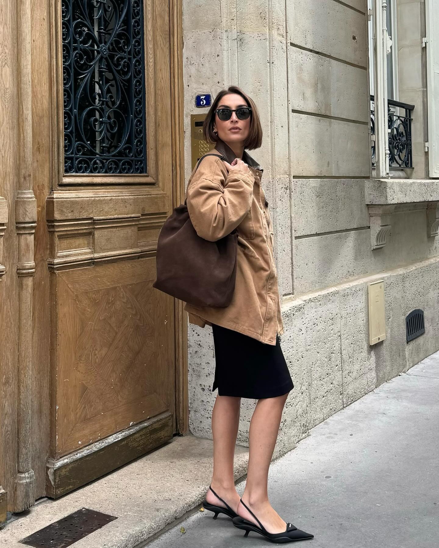 French influencer wearing a knee-length skirt