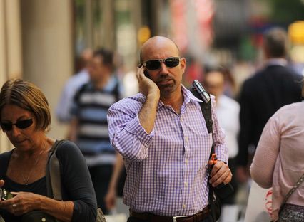 man speaking on mobile phone