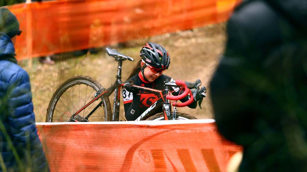 Martina Kukulova picks up her bike to run