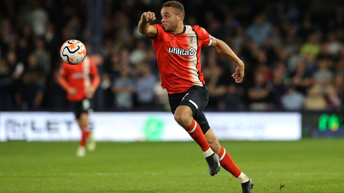 Carlton Morris runs with the ball ahead of the Luton Town vs Wolves live stream 2023