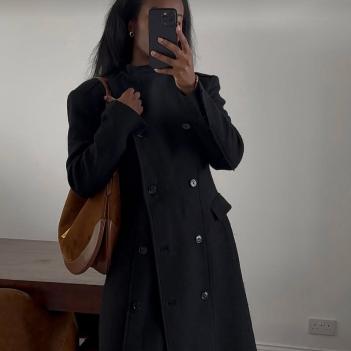 Marilyn NK wearing an H&amp;amp;M coat