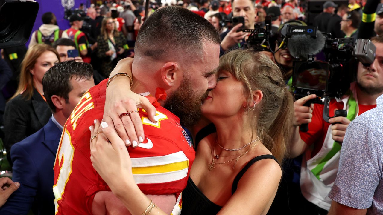 ravis Kelce #87 of the Kansas City Chiefs and Taylor Swift embrace after defeating the San Francisco 49ers in overtime during Super Bowl LVIII at Allegiant Stadium on February 11, 2024 in Las Vegas, Nevada.