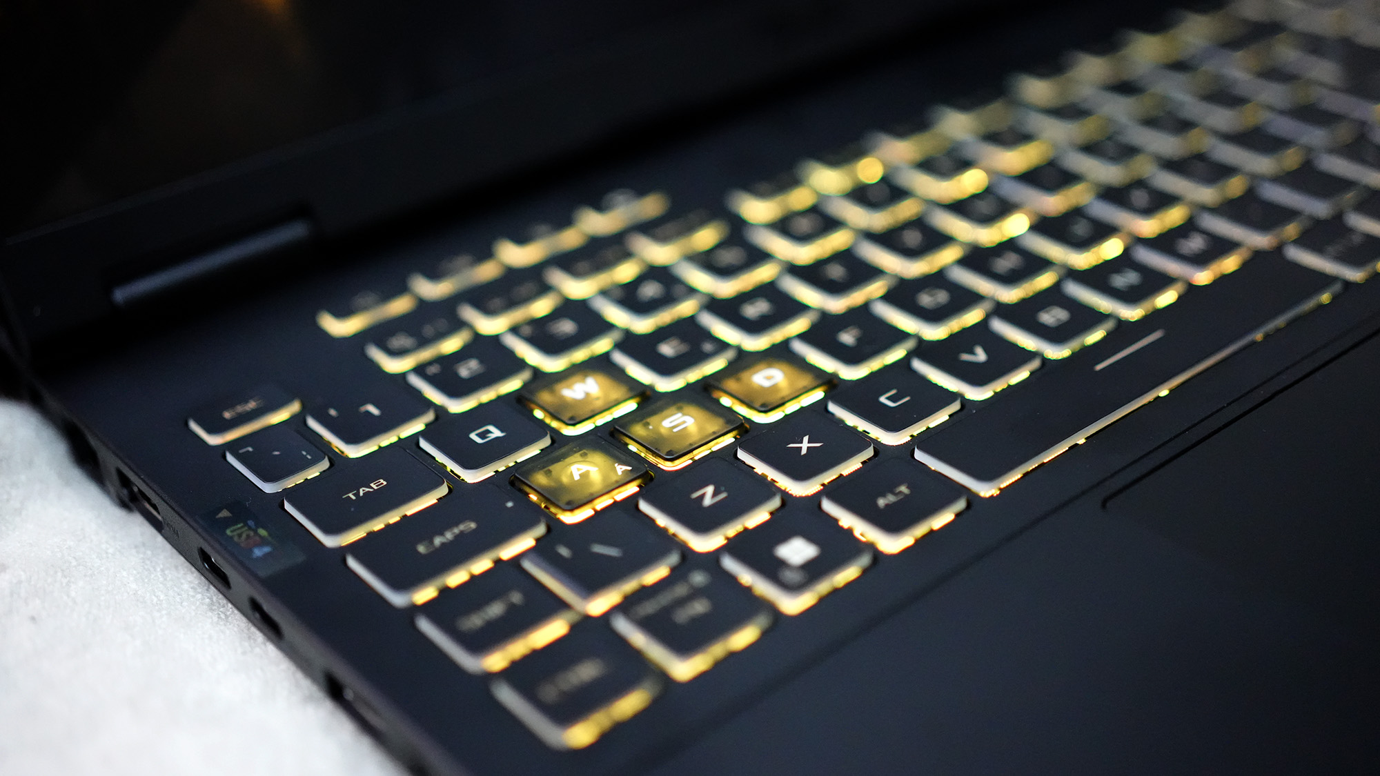 An Asus TUF Gaming A16 2025 on a white background, fit with an RTX 5050.