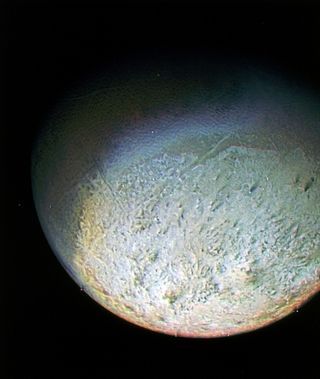 NASA's Voyager 2 spacecraft captured this color photo of Triton, Neptune's biggest moon, in August 1989. On Oct. 5, 2017, scientists tracked a star as it passed behind Triton using telescopes on Earth.