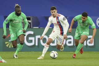 Lyon midfielder Bruno Guimaraes, centre, has been linked with Newcastle