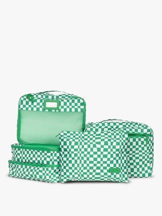 Calpak's green checkerboard packing cubes set