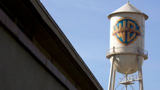 Warner Bros Entertainment Inc. signage is displayed on a water tower in Burbank, California, U.S., on Saturday, Dec. 11, 2010.